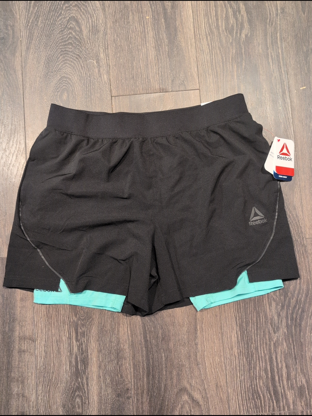 Reebox Men's Strength 2-IN-1 Woven Shorts Pockets Quick Dry Black Teal NWT L